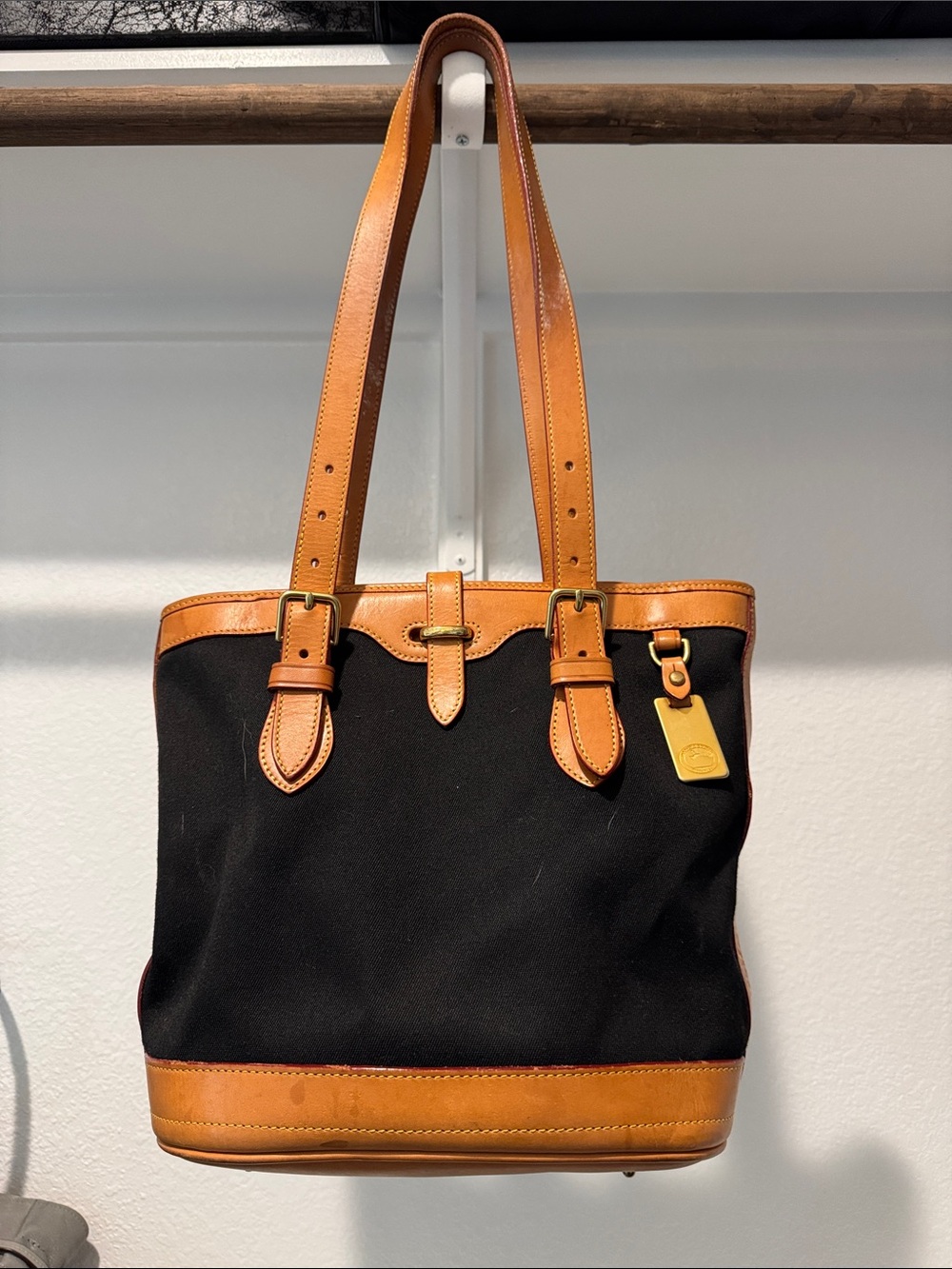 Dooney & Bourke Black Canvas Tote with Tan Leather Trim and Tag